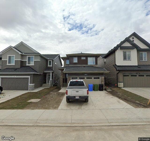 Street view of 87 Lewiston View NE, Calgary