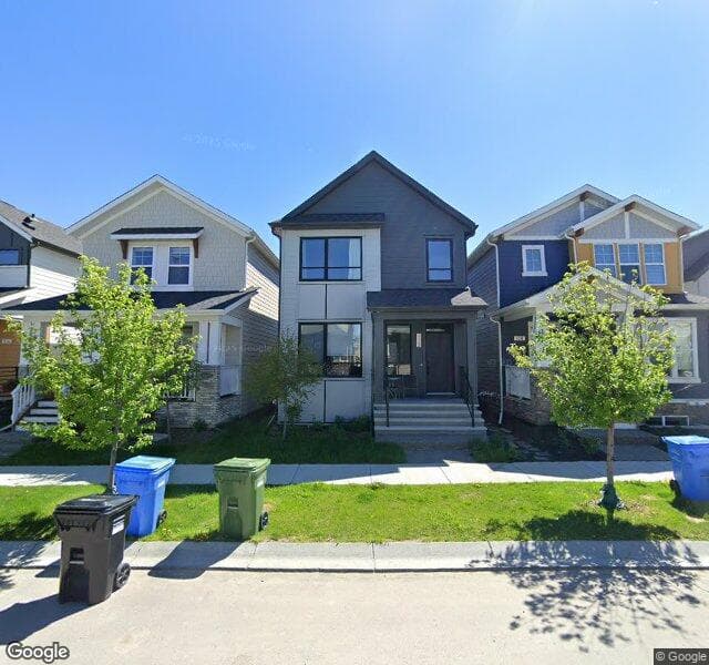 Street view of 112 Treeline Manor SW, Calgary