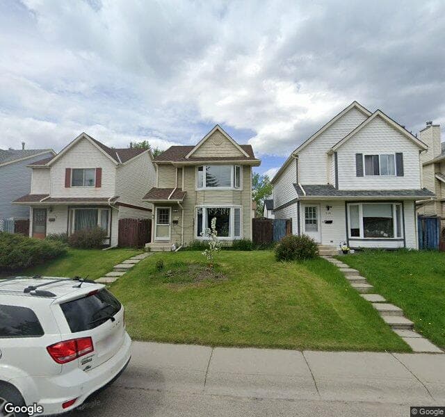 Street view of 110 Queen Anne Close SE, Calgary