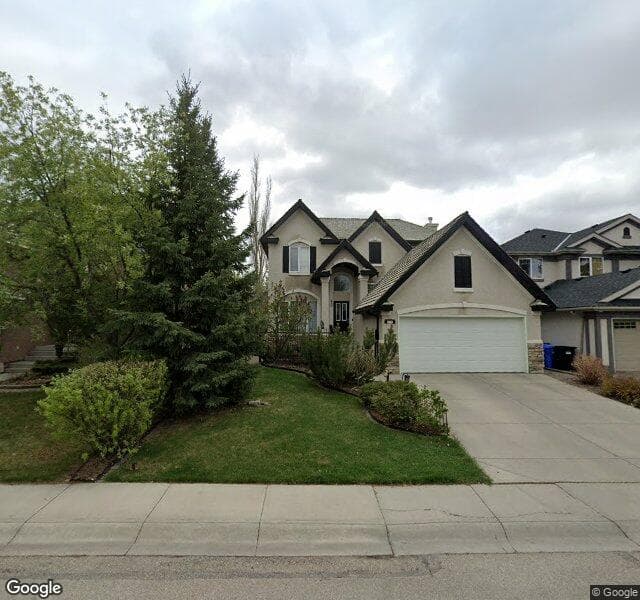 Street view of 33 Evergreen Crescent SW, Calgary