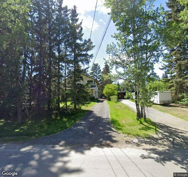 Street view of 7115 Bow Crescent NW, Calgary