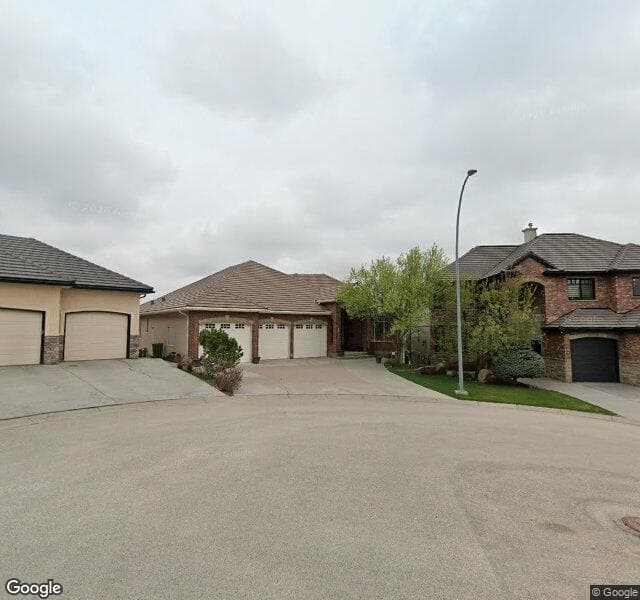 Street view of 32 Hamptons Cove NW, Calgary