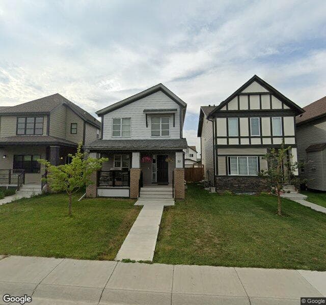 Street view of 21 Copperpond Avenue SE, Calgary