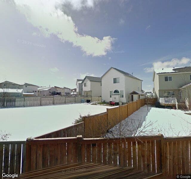 Street view of 23 Hidden Mews NW, Calgary