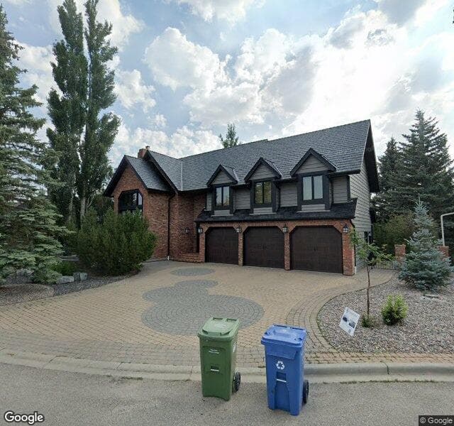 Street view of 148 Woodacres Drive SW, Calgary