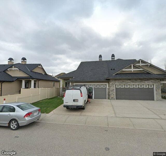 Street view of 37 Evercreek Bluffs View SW, Calgary