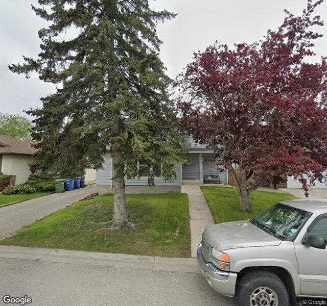 Street view of 107 Deercroft Place SE, Calgary