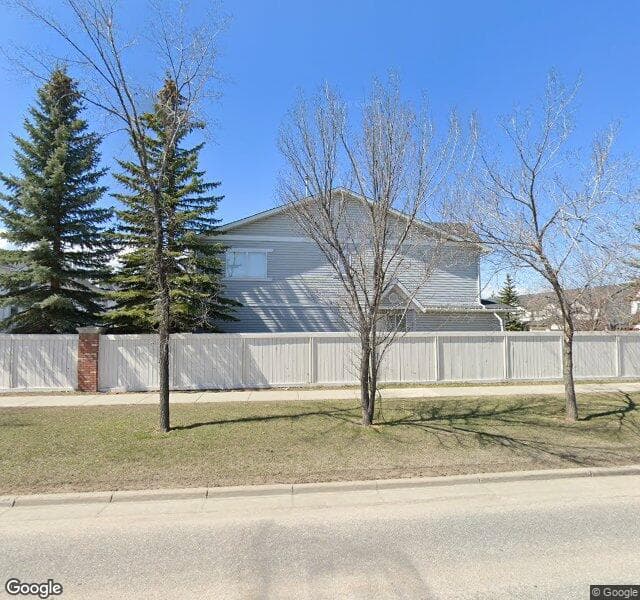 Street view of 225 Country Village Cape NE, Calgary