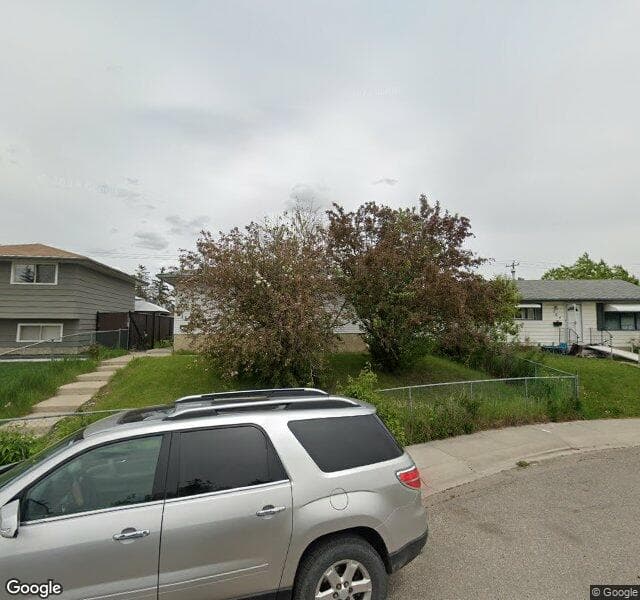 Street view of 211 Penbrooke Close SE, Calgary