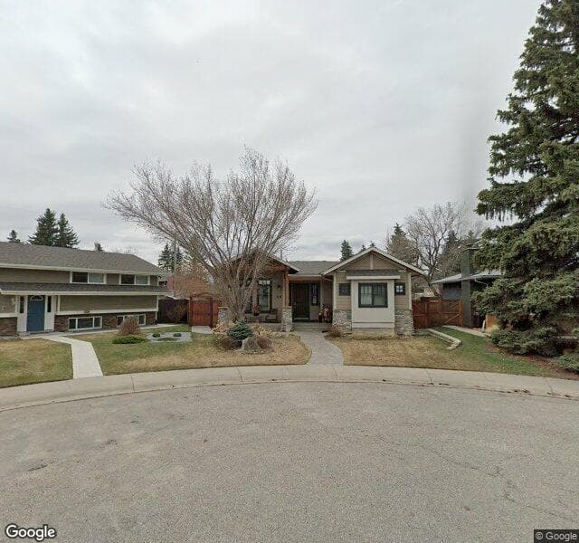 Street view of 16 Lake Adams Place SE, Calgary