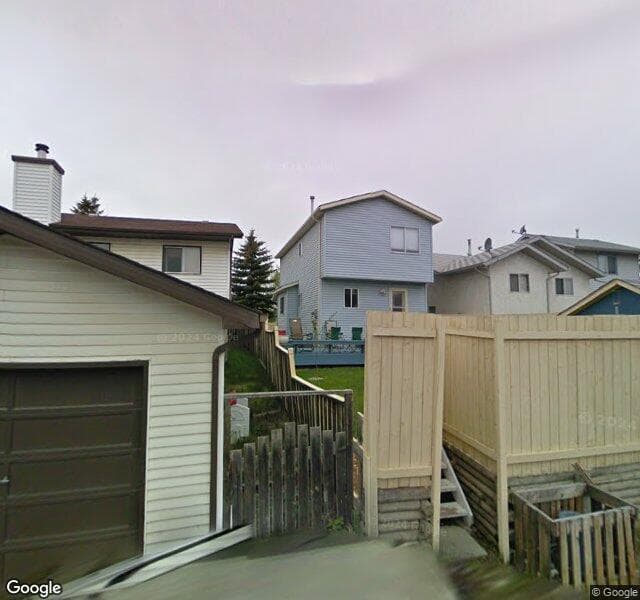 Street view of 107 Riverbrook Way SE, Calgary