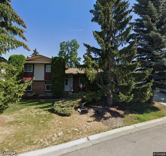 Street view of 135 Ranchero Place NW, Calgary