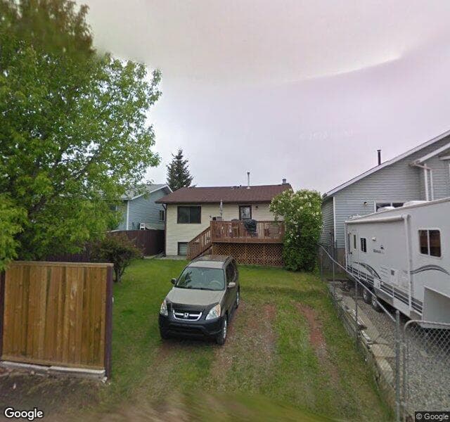 Street view of 24 Riverbrook Way SE, Calgary