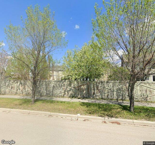 Street view of 703 Copperpond Circle SE, Calgary