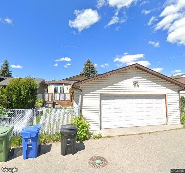 Street view of 428 Rundlelawn Way NE, Calgary