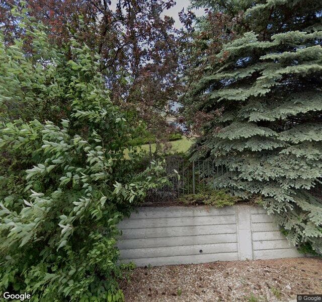 Street view of 8 Patina Hill SW, Calgary