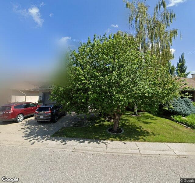 Street view of 46 Sunset Way SE, Calgary