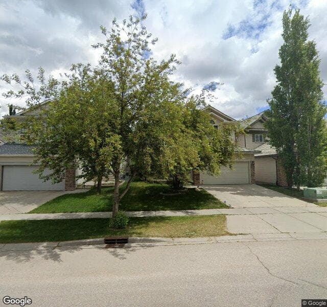 Street view of 408 Rocky Ridge Drive NW, Calgary