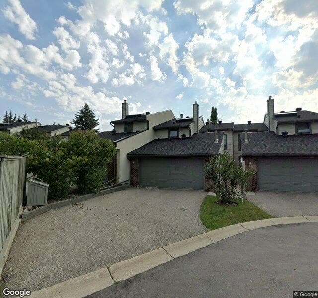 Street view of 9-185 Woodridge Drive SW, Calgary