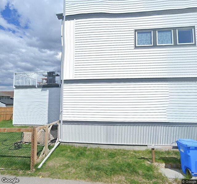 Street view of 232 Lucas Manor NW, Calgary