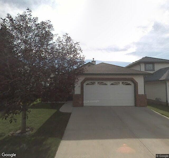 Street view of 408 Scenic View Bay NW, Calgary