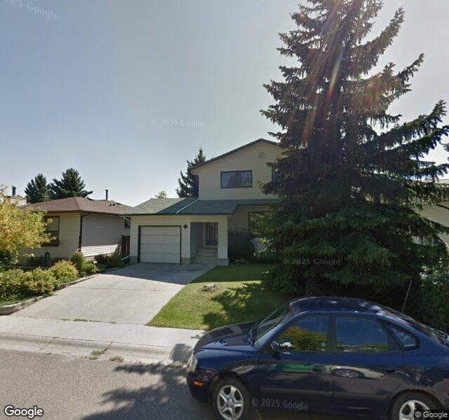 Street view of 99 Woodford Drive SW, Calgary