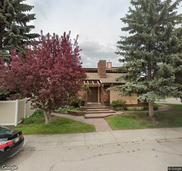 Street view of 448 Deer Side Place SE, Calgary