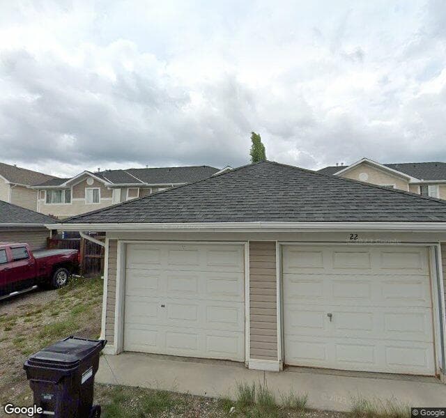 Street view of 24 Bridleridge Gardens SW, Calgary