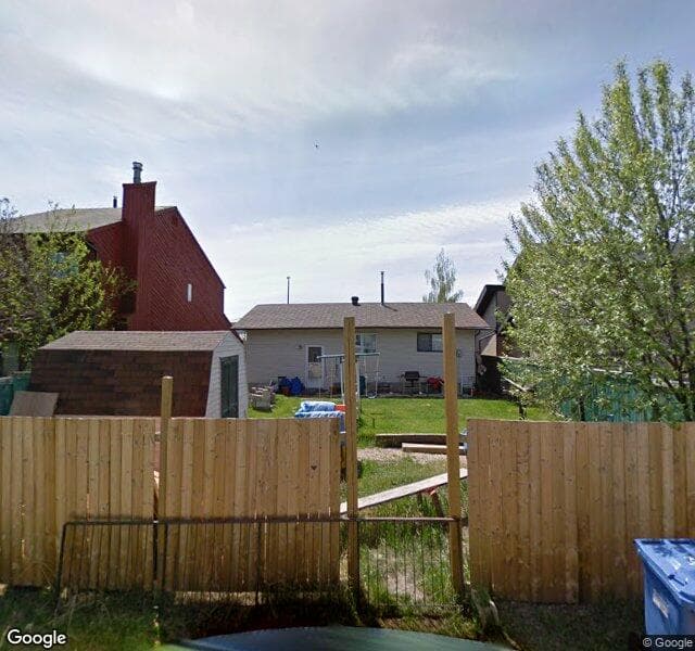 Street view of 244 Woodbrook Mews SW, Calgary