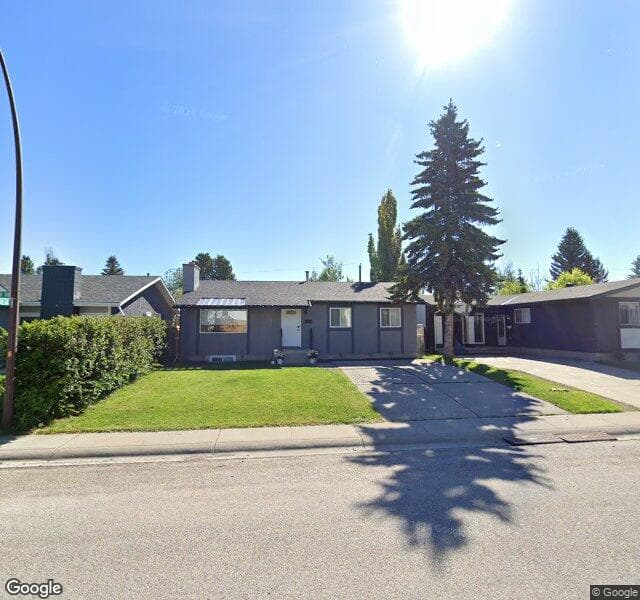 Street view of 428 Cedarpark Drive SW, Calgary