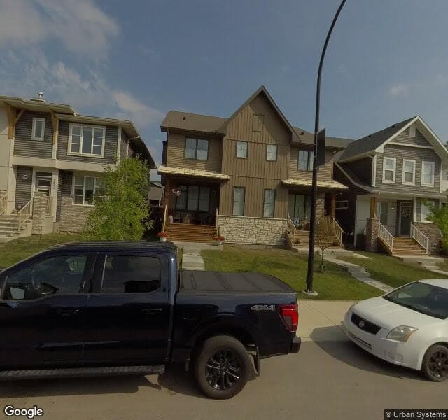 Street view of 244 Rowmont Boulevard NW, Calgary