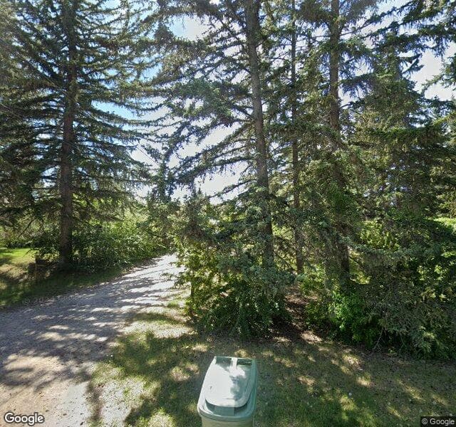 Street view of 7123 Bow Crescent NW, Calgary