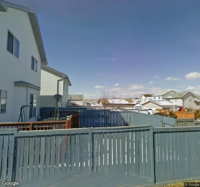 Street view of 10 Hidden Spring Green NW, Calgary
