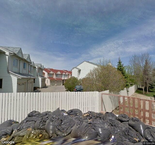 Street view of 1-468 Woodbine Boulevard SW, Calgary
