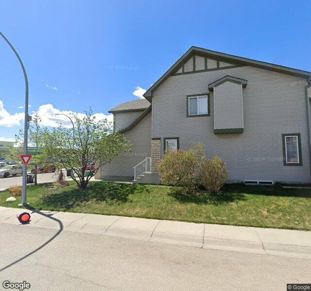 Street view of 124 Brightonstone Bay SE, Calgary