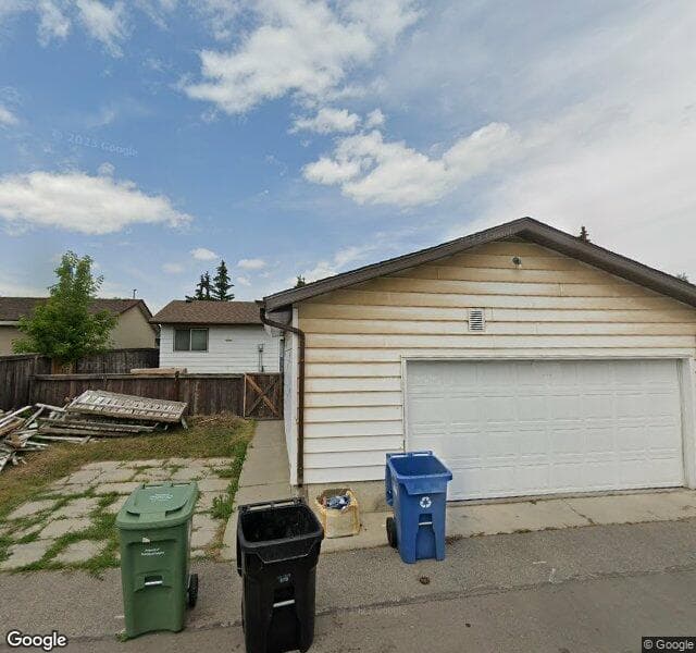 Street view of 6723 8 Avenue NE, Calgary
