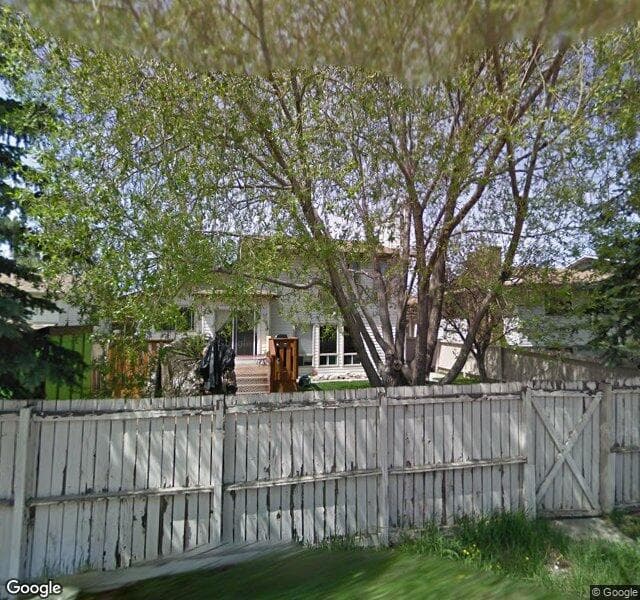 Street view of 111 Woodbrook Mews SW, Calgary