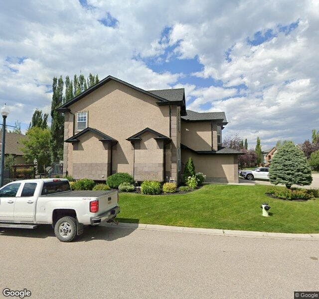 Street view of 96 Strathlea Court SW, Calgary
