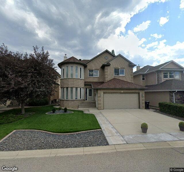 Street view of 23 Strathlea Close SW, Calgary
