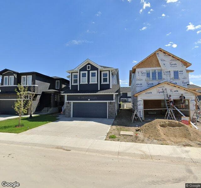 Street view of 49 Evansfield Manor NW, Calgary