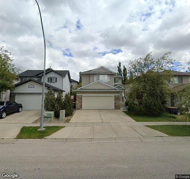Street view of 512 Rocky Ridge Drive NW, Calgary