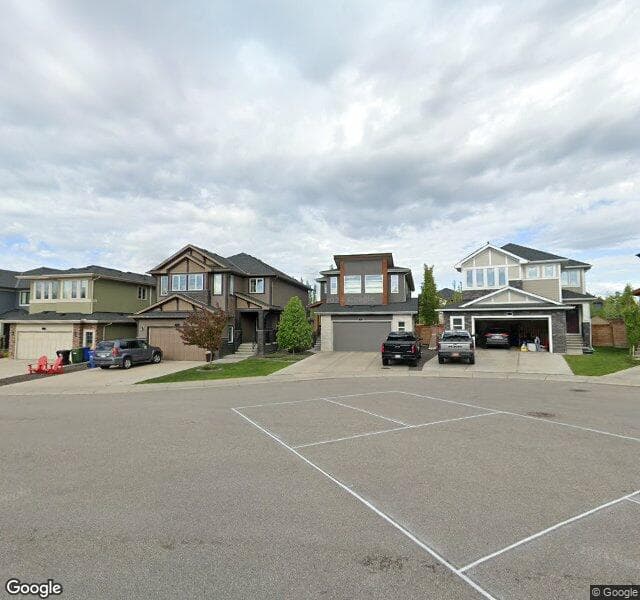 Street view of 347 Tremblant Heights SW, Calgary