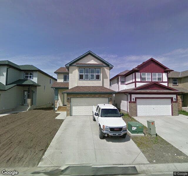 Street view of 65 Everglen Close SW, Calgary