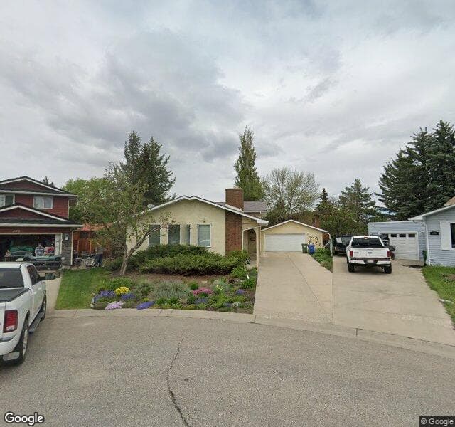 Street view of 219 Deer Side Place SE, Calgary