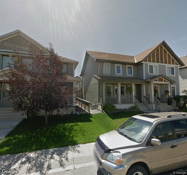 Street view of 23 Copperpond Place SE, Calgary