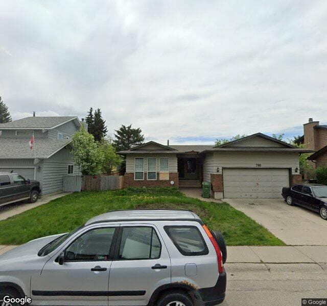 Street view of 708 Deercroft Way SE, Calgary