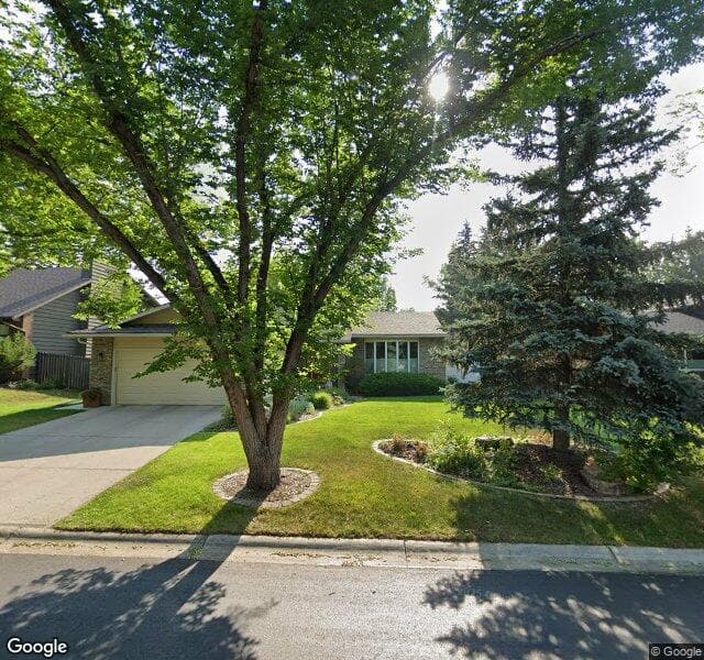 Street view of 727 Woodpark Road SW, Calgary
