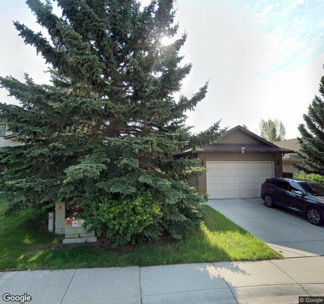 Street view of 36 Woodstock Way SW, Calgary