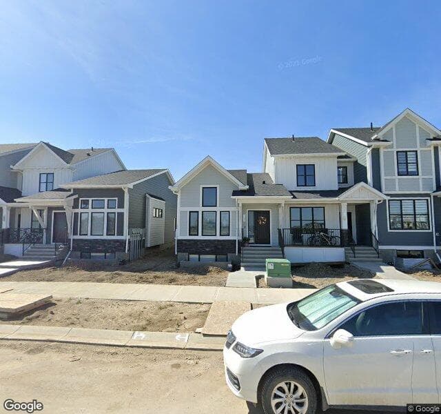 Street view of 1046 Creekside Boulevard SW, Calgary