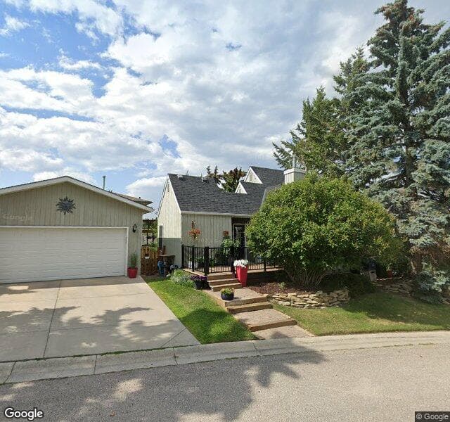 Street view of 104 Coach Manor Terrace SW, Calgary